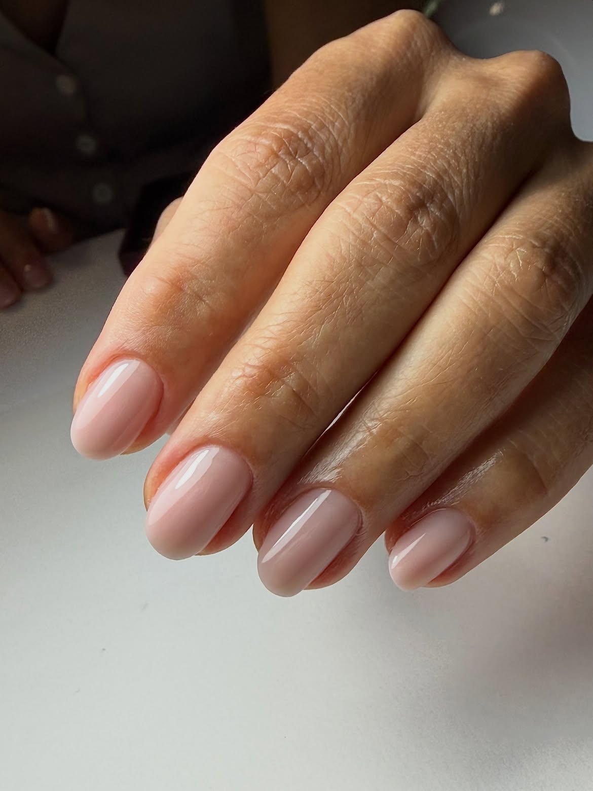Milky Nude Oval Nails with High Gloss Finish