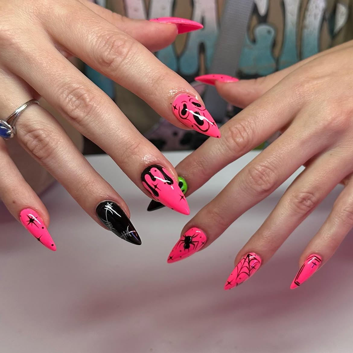 Neon Pink Halloween Drip & Spiderweb Stiletto Nails