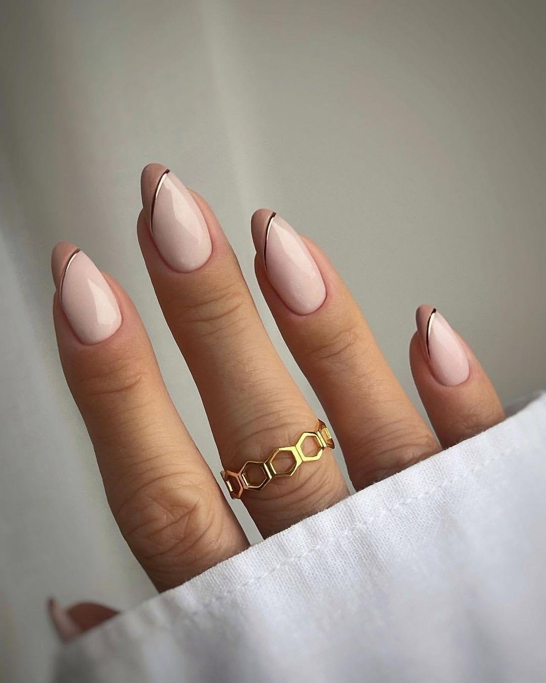 Nude Almond Nails With Rose Gold French Outline
