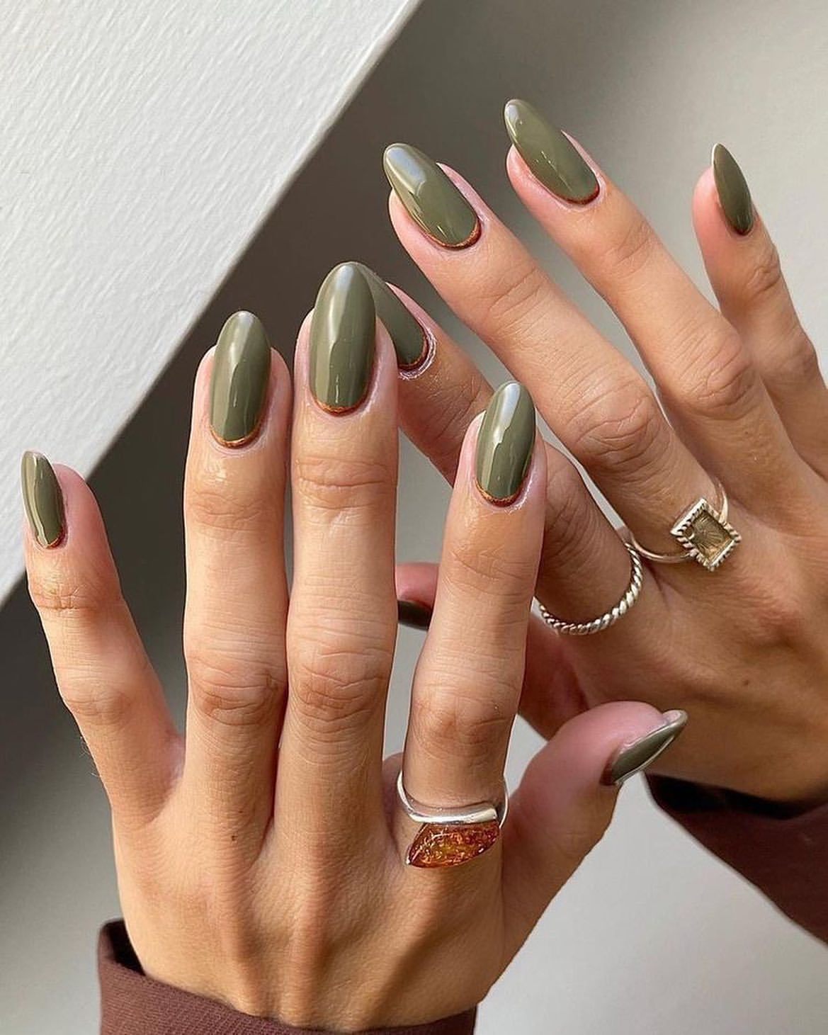 Olive Green Almond Nails with Rose Gold Outline