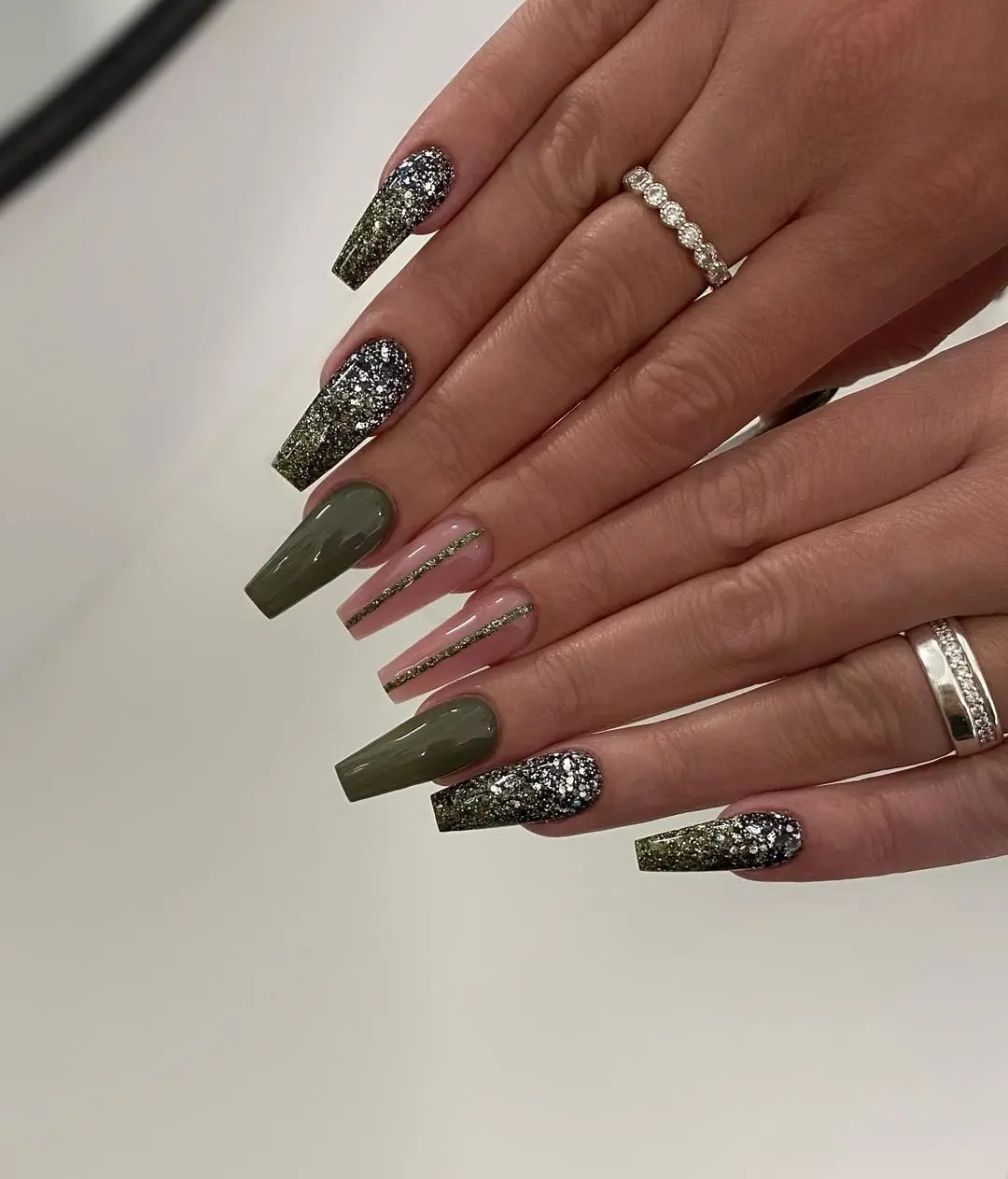 Olive Green Glitter Ombre Coffin Nails with Gold Stripe
