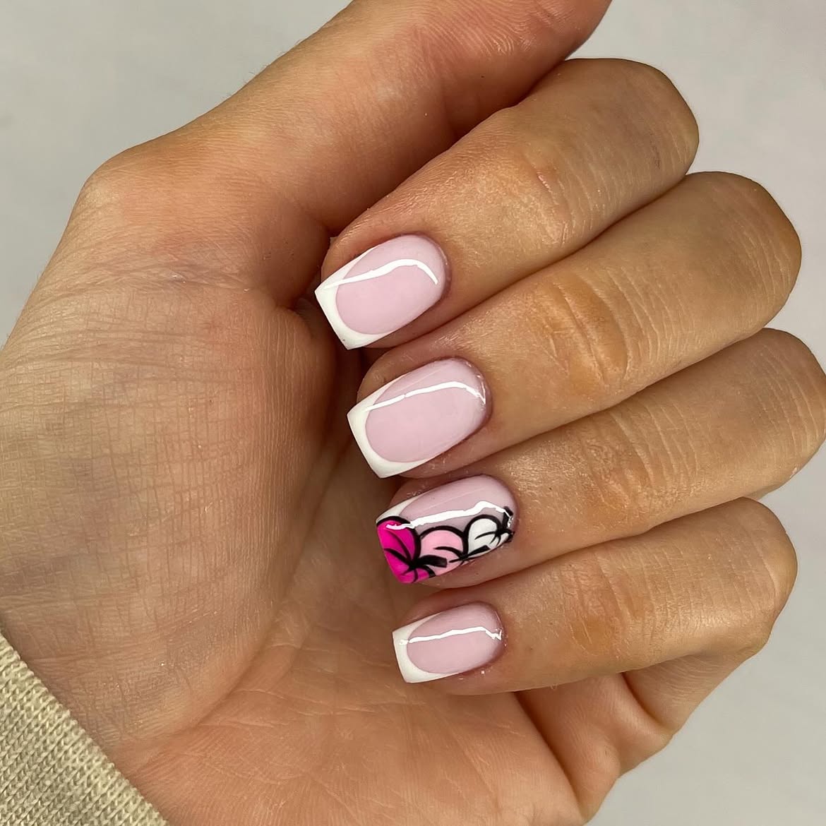 Pink French Tips with Floral Accent Nail