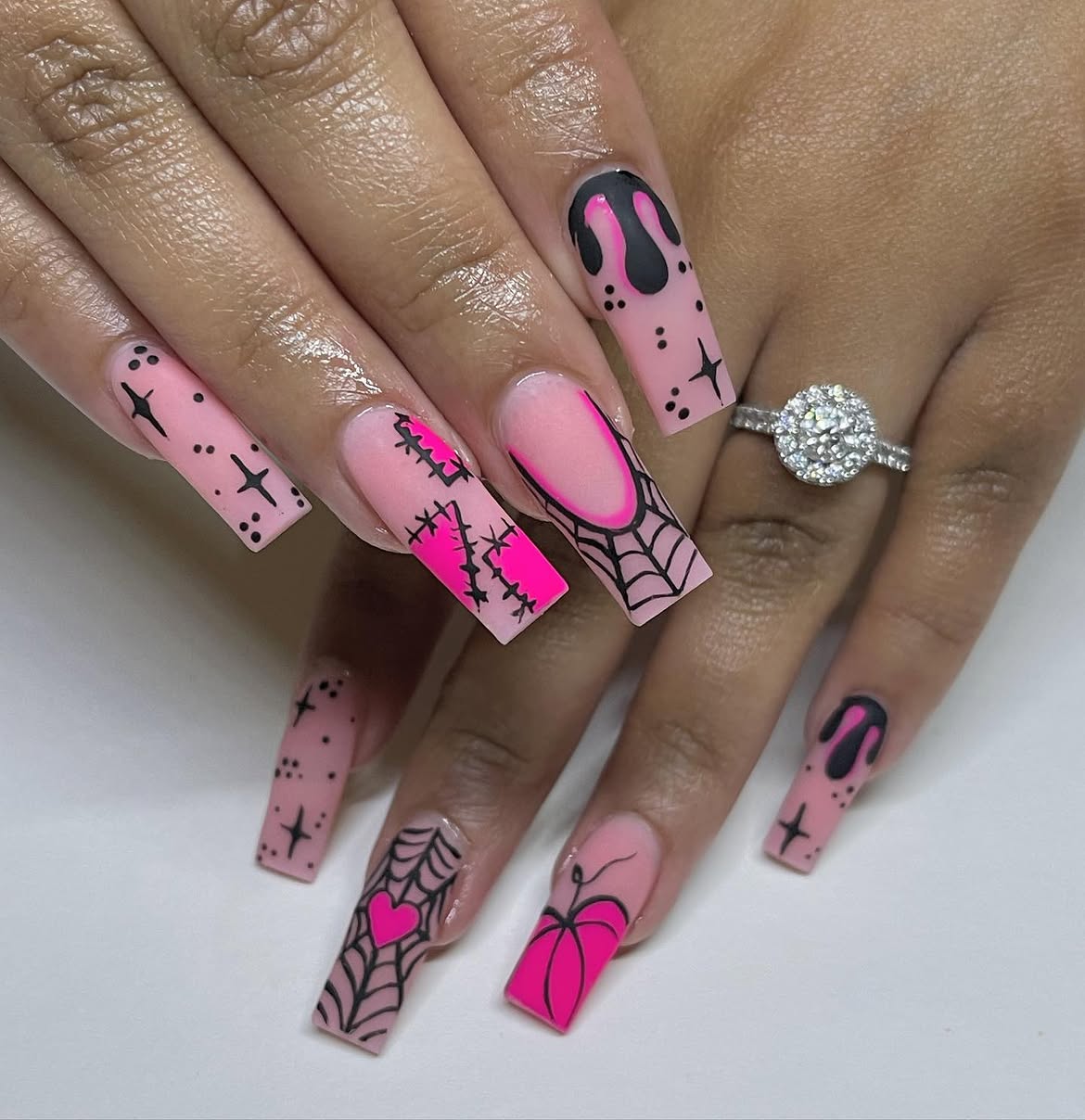 Pink Halloween Coffin Nails with Spiderwebs and Drippy Accents