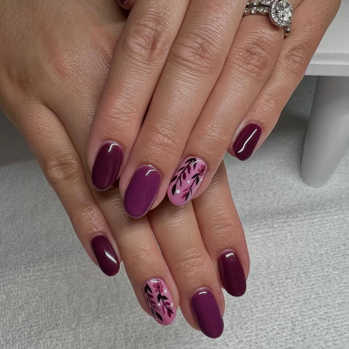 Plum Berry Oval Nails with Floral Accents