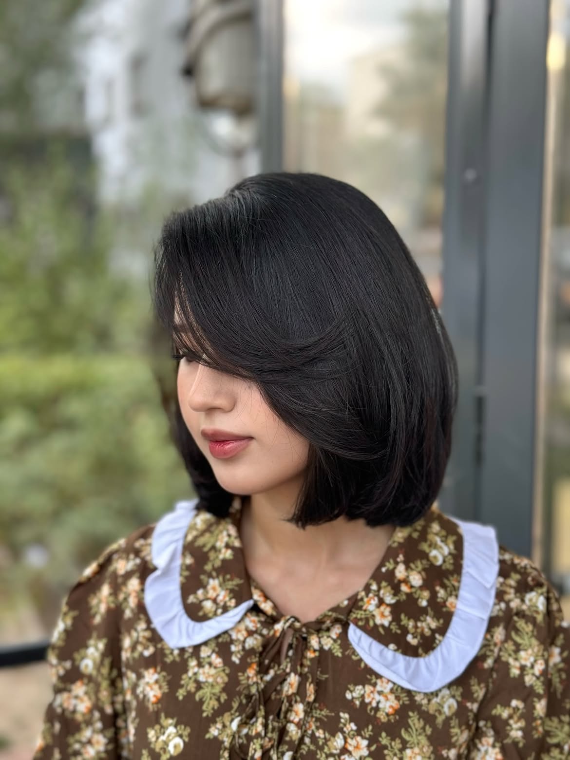 Polished Chin Length Bob With Voluminous Side Swept Bangs