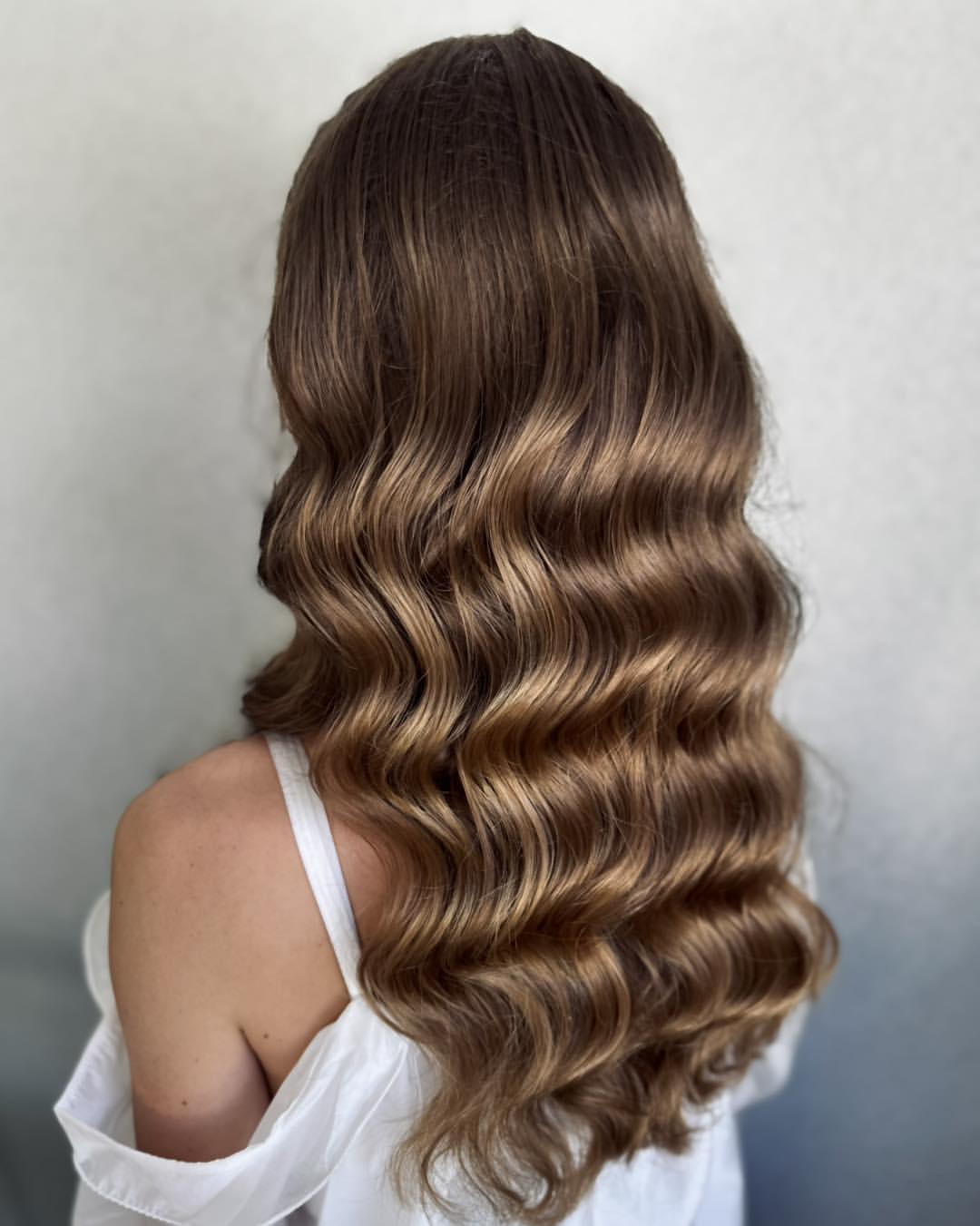Polished Hollywood Waves On Brunette Mid Length Hair