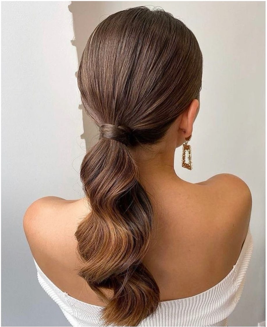 Polished Low Ponytail With Soft Wavy Texture