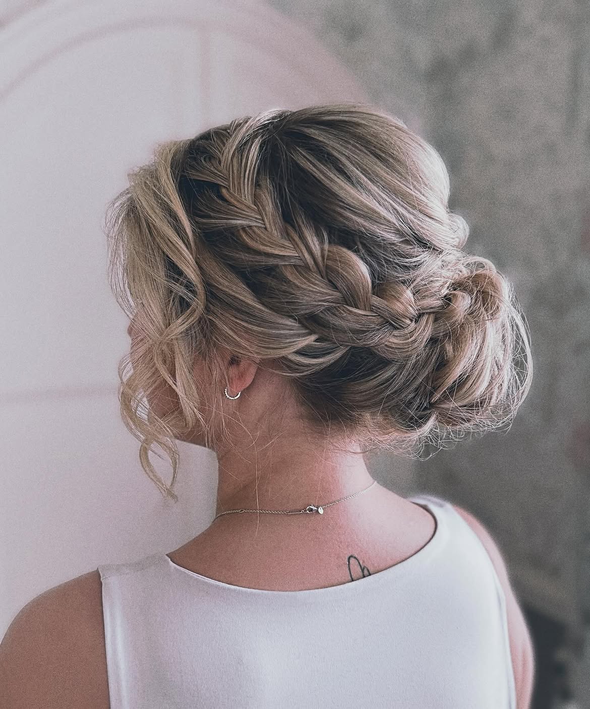 Romantic Braided Updo With Loose Curls