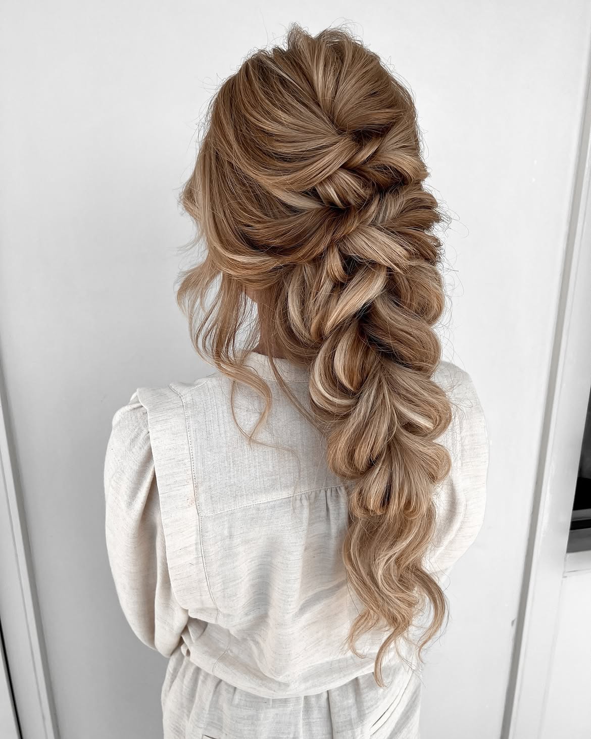 Romantic Braided Updo With Loose Curls