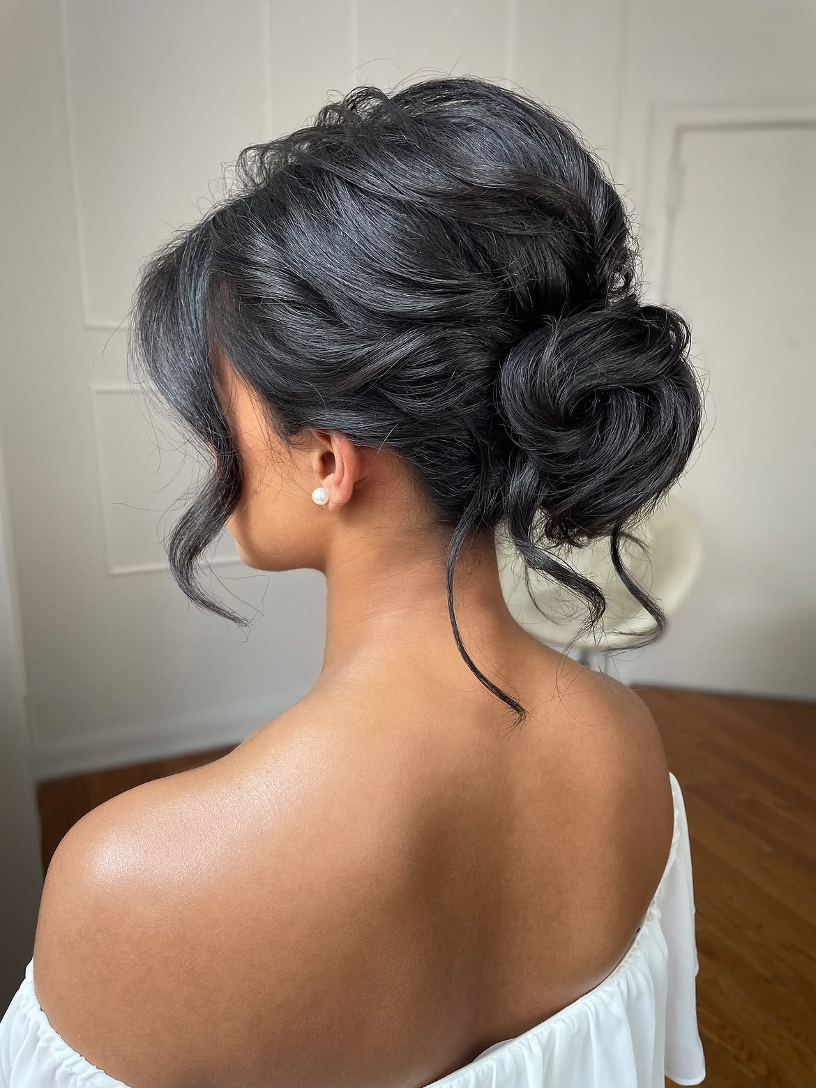 Romantic Chignon With Loose Tendrils