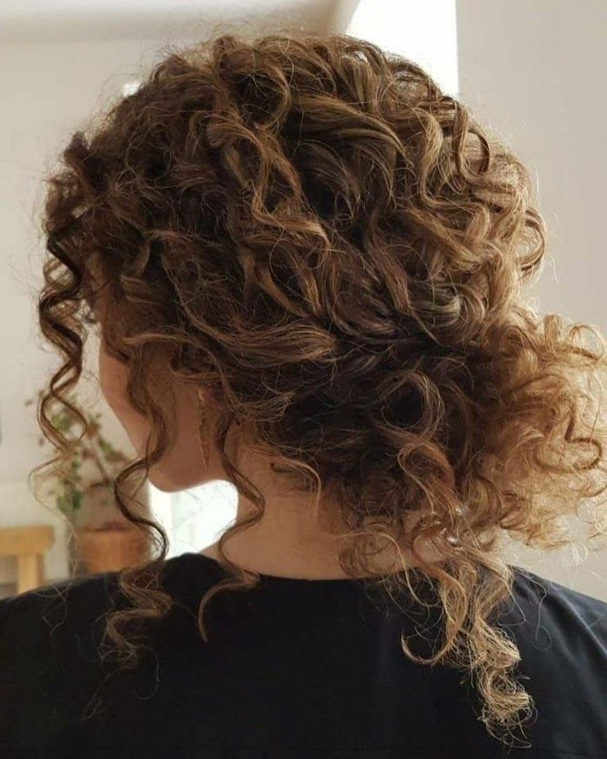 Romantic Low Messy Bun For Curly Hair