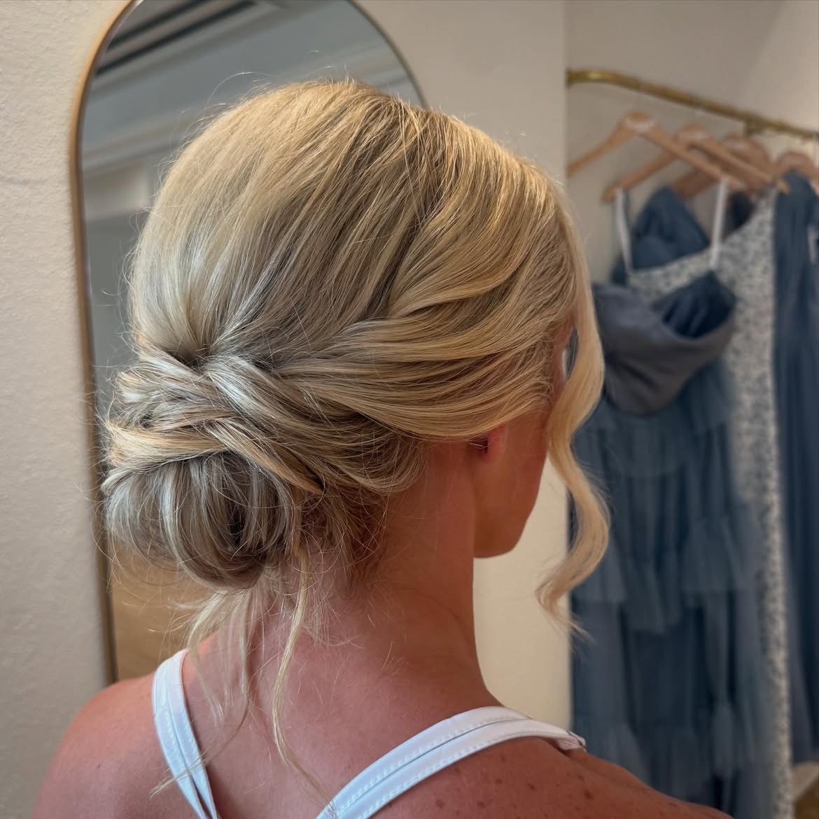Romantic Twisted Low Bun With Face Framing Tendrils