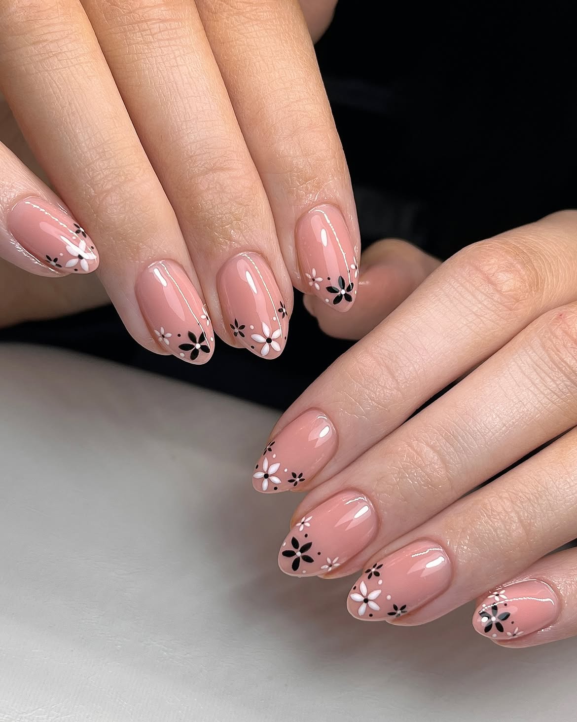 Sheer Pink Floral French Tip Almond Nails