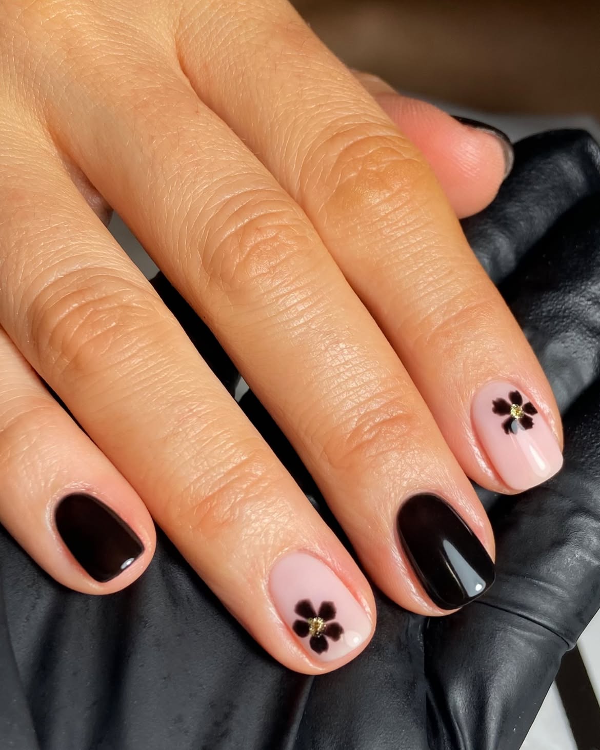 Short Black and Pink Floral Accent Nails