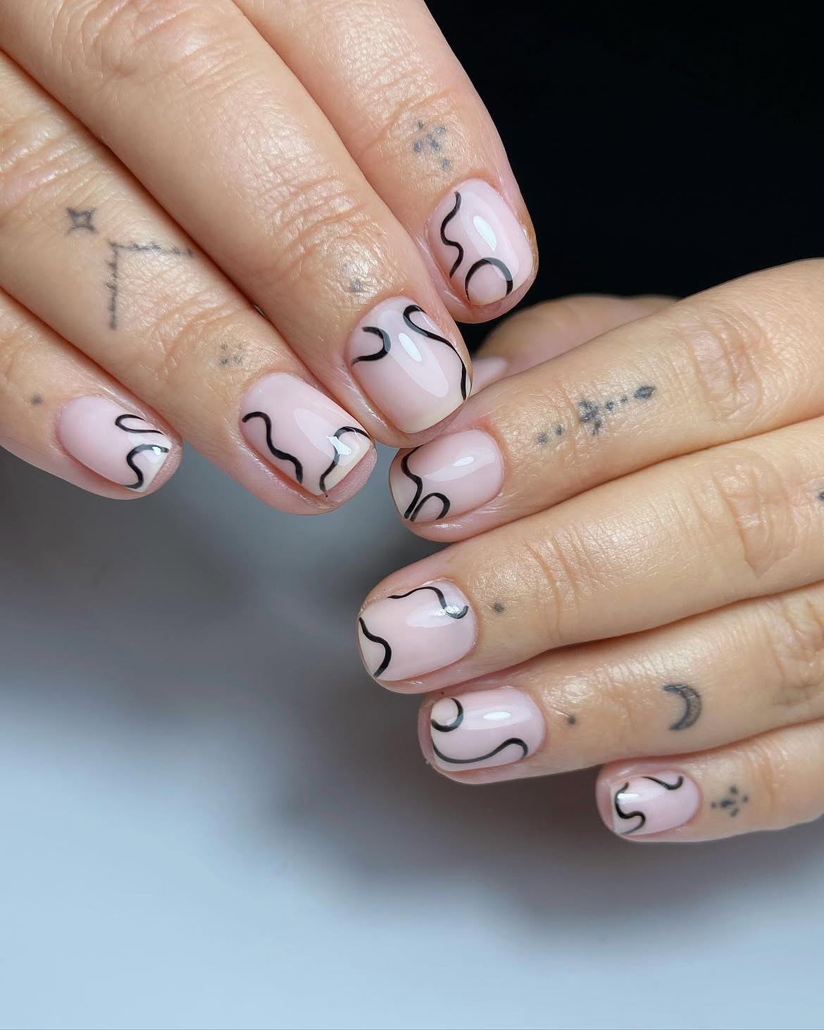 Short Squoval Nails with Black Swirl Art