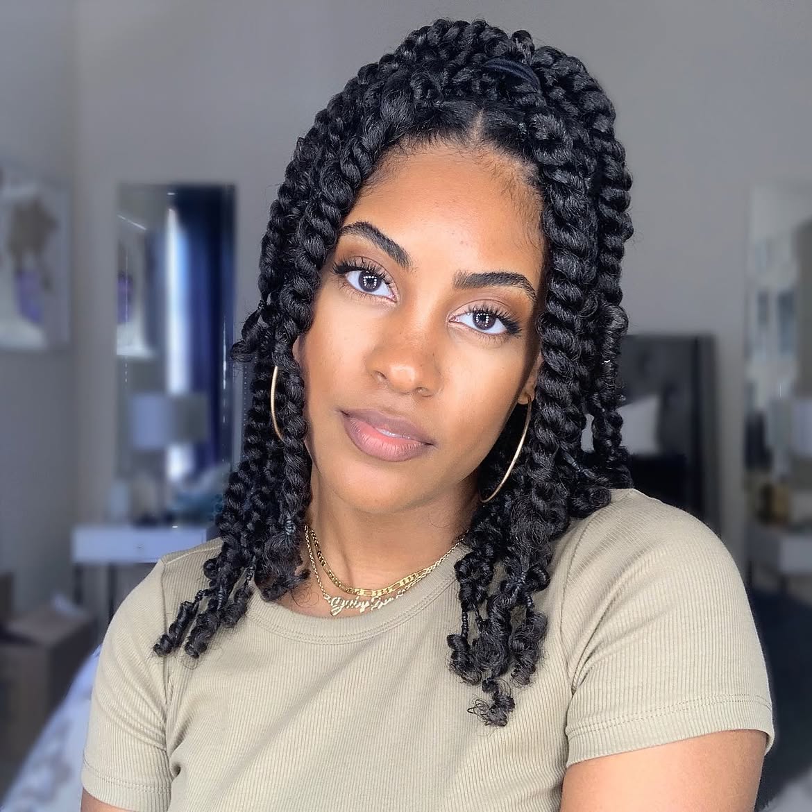 Shoulder Length Passion Twist Braids With Half Up Styling