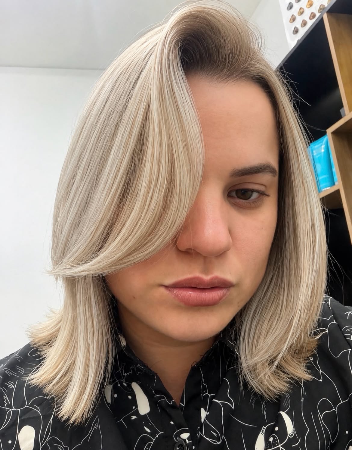 Side Swept Bangs On Sleek Platinum Lob