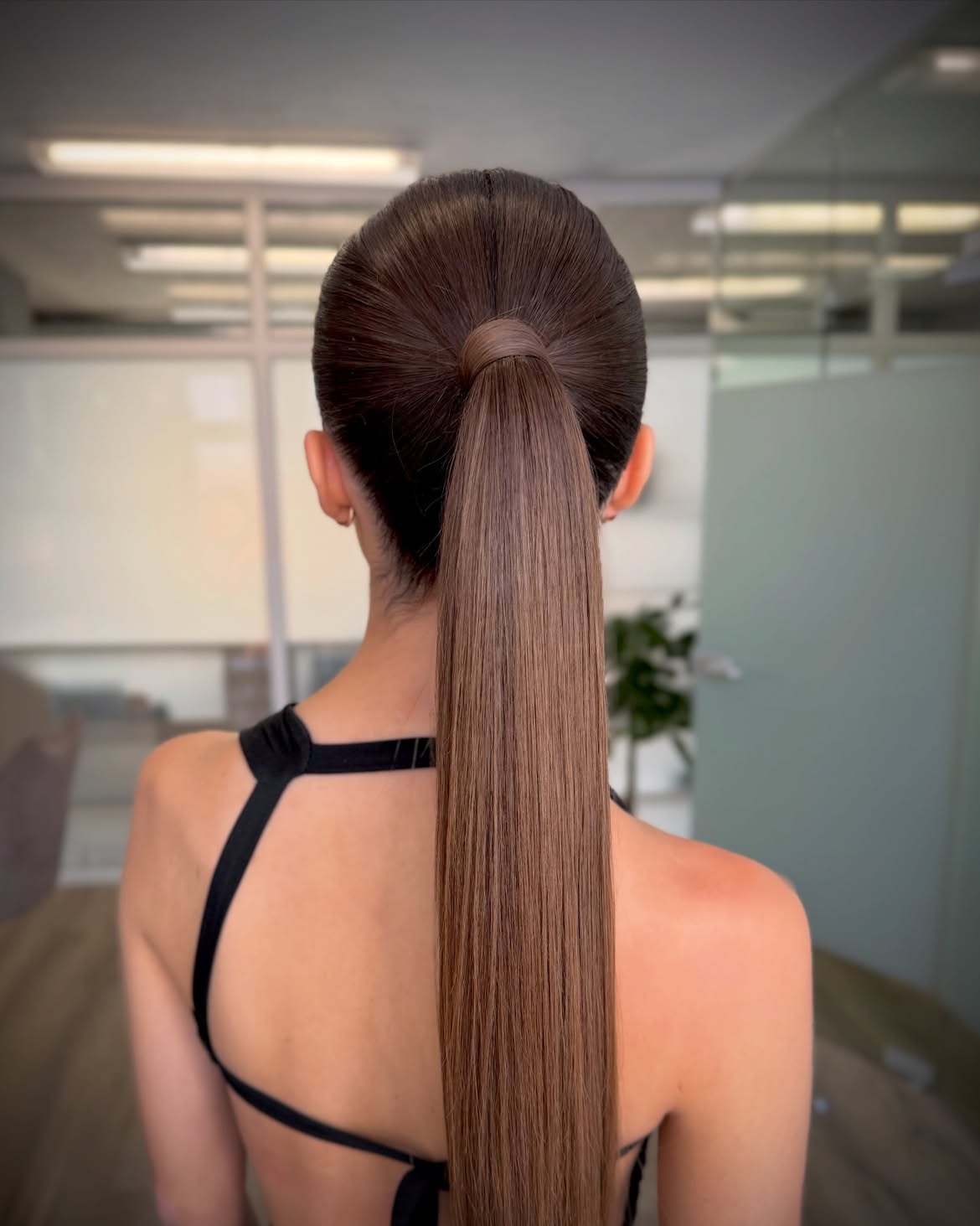 Sleek And Polished High Ponytail With Wrapped Base