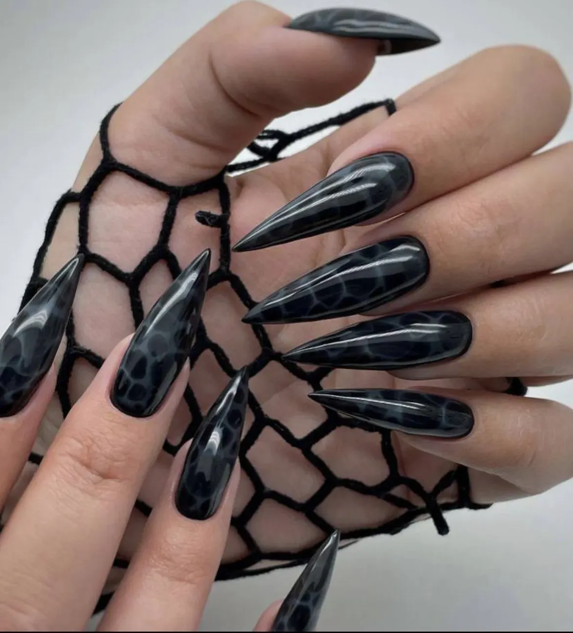 Sleek Black Stiletto Snake Print Nails