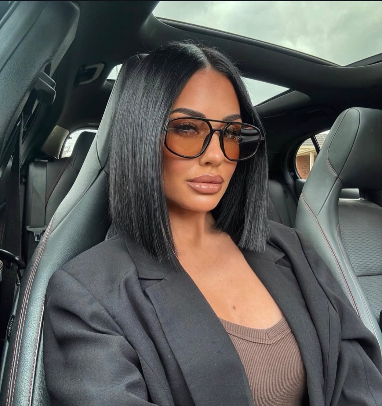 Sleek Blunt Black Bob with Side Part