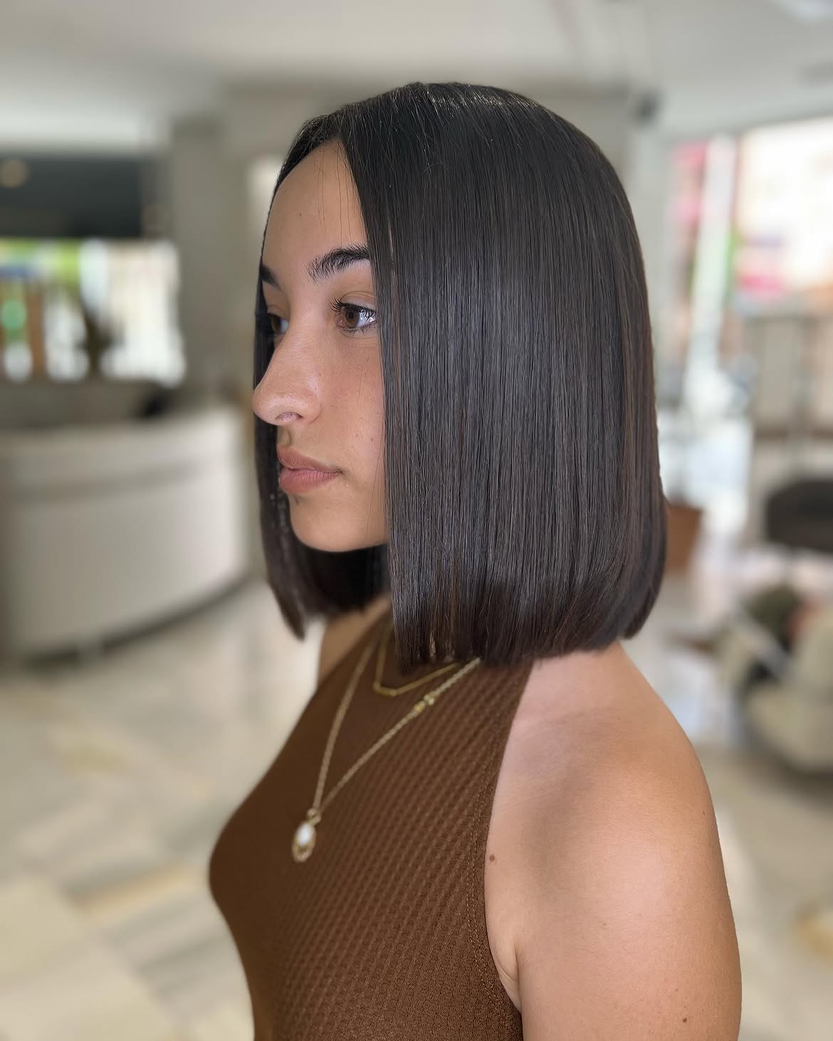 Sleek Blunt Bob With Deep Side Part