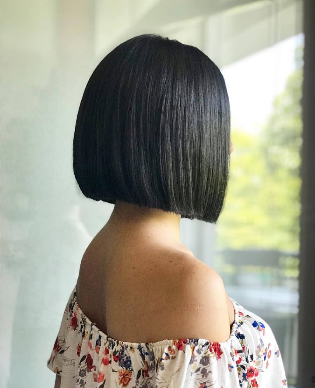 Sleek Blunt Bob With Deep Side Part