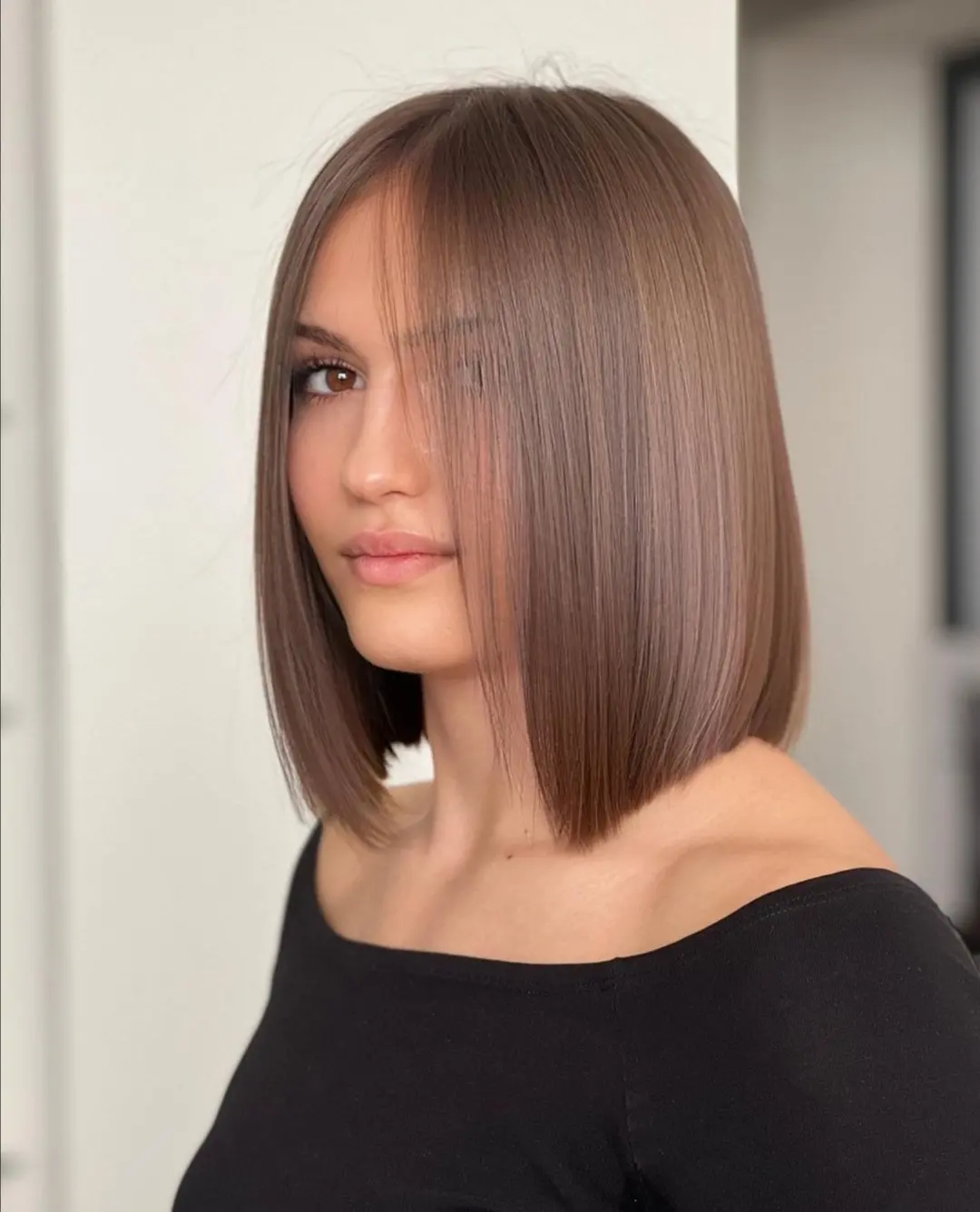 Sleek Chocolate Brown Bob With Face-Framing Pieces