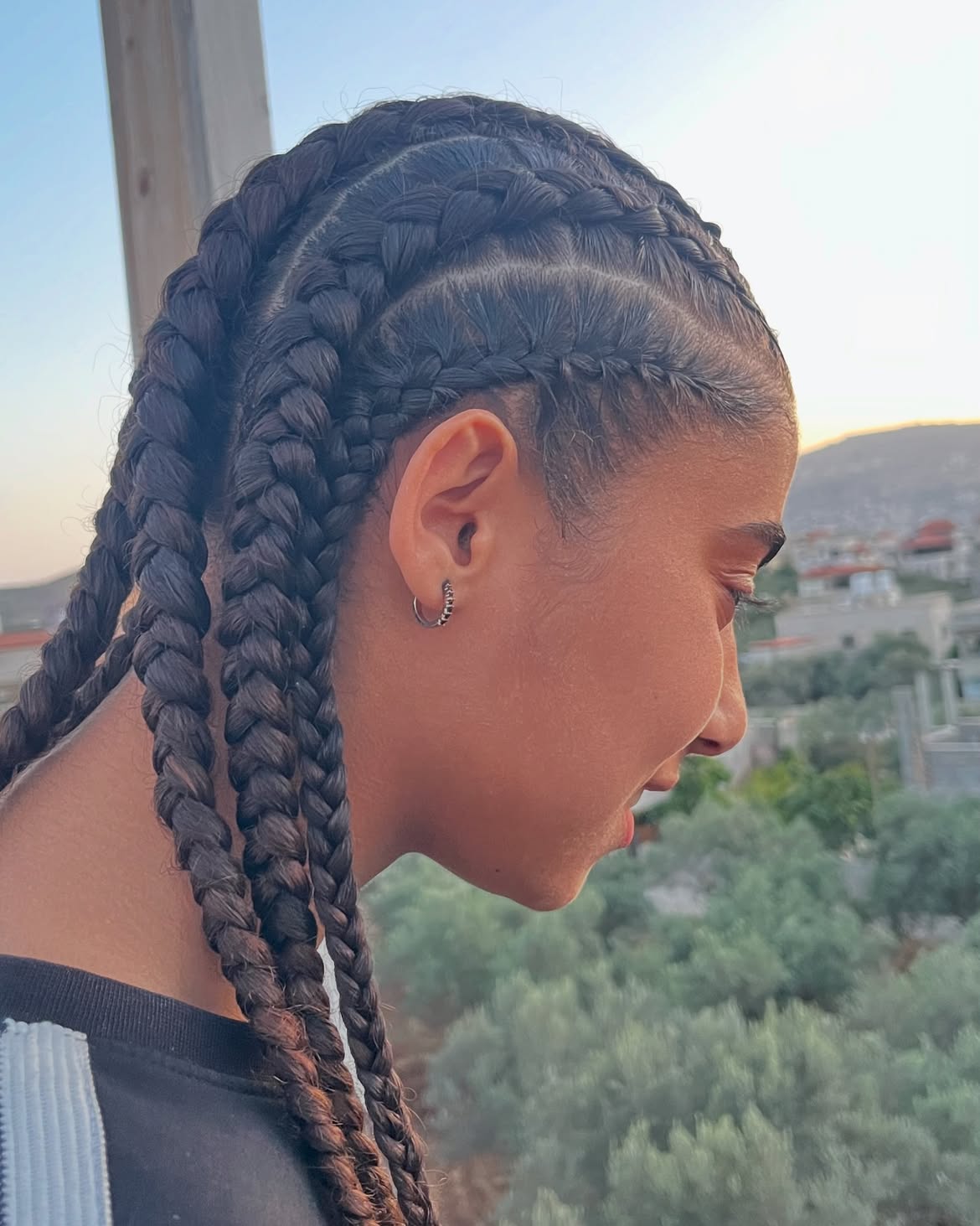 Sleek Cornrow Braids With Clean Parting