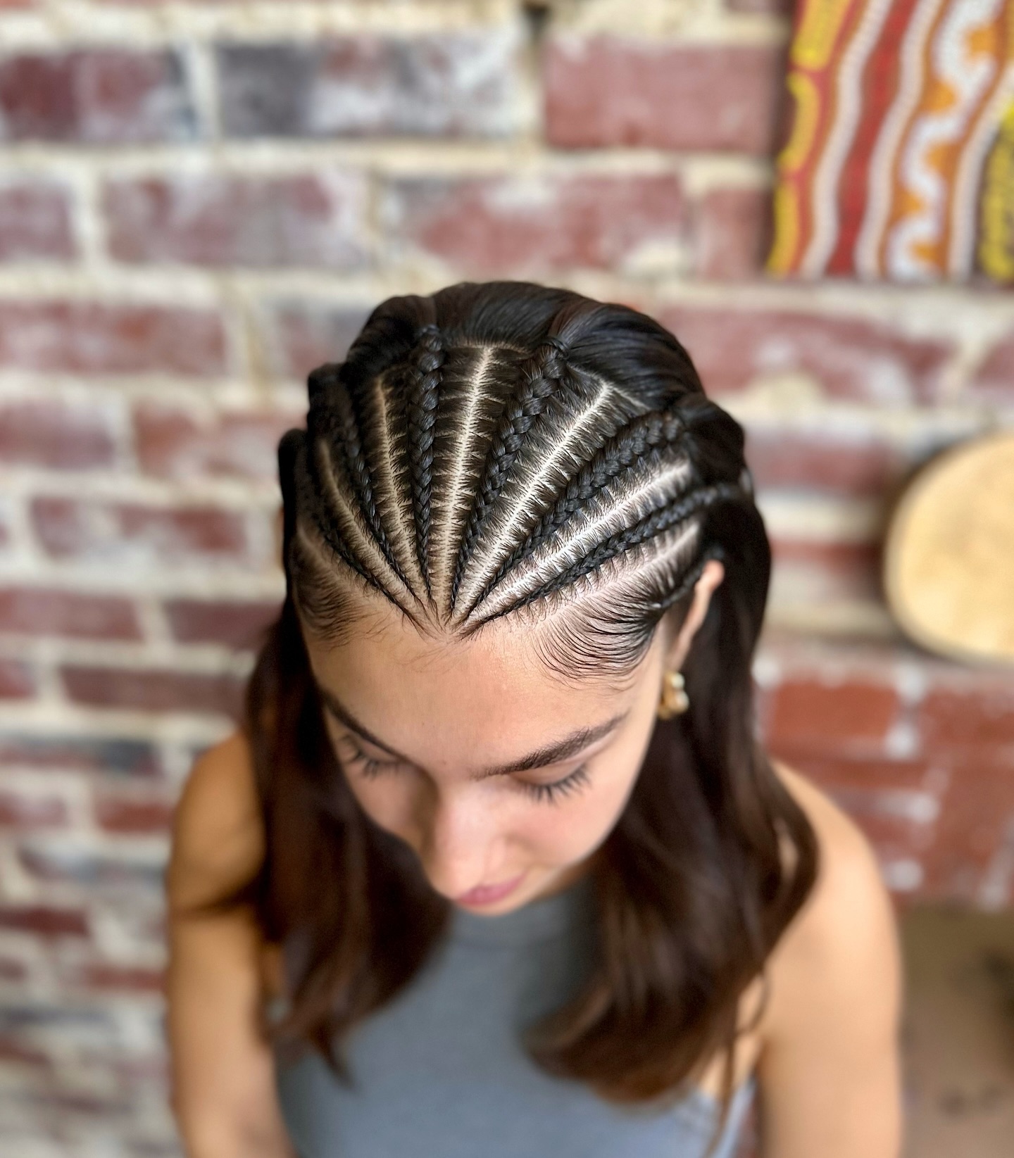 Sleek Cornrow Braids With Loose Flowing Waves