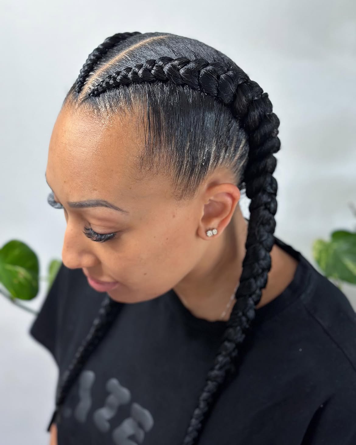 Sleek Dual Dutch Braids With Natural Texture