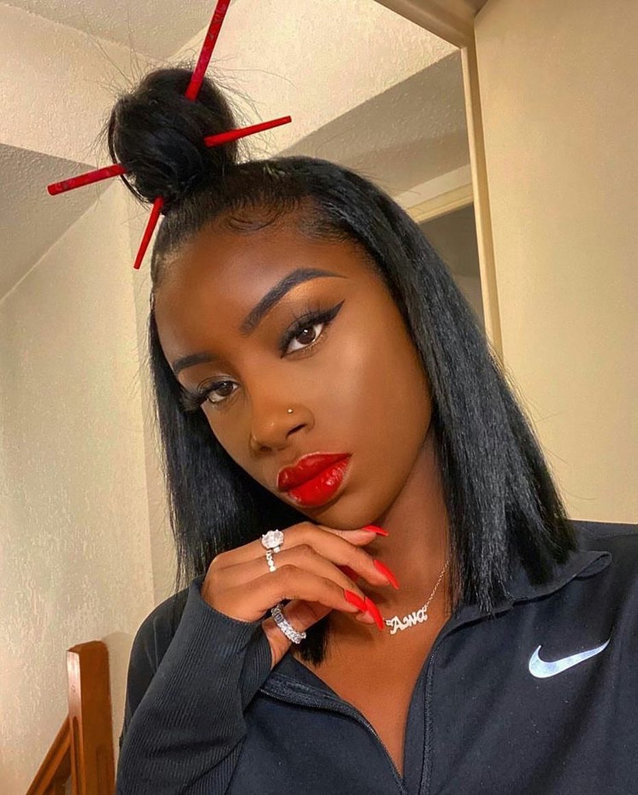 Sleek Half Up Top Knot With Hair Sticks