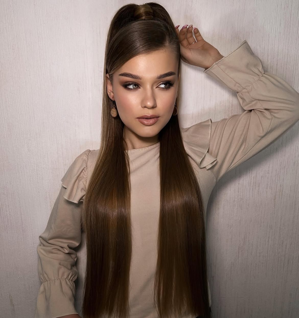 Sleek High Ponytail With Deep Side Part