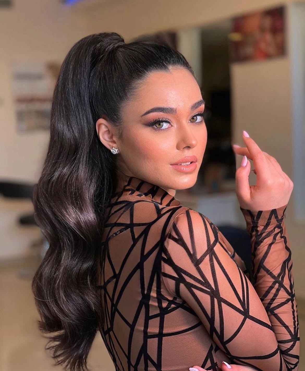 Sleek High Ponytail With Hollywood Waves