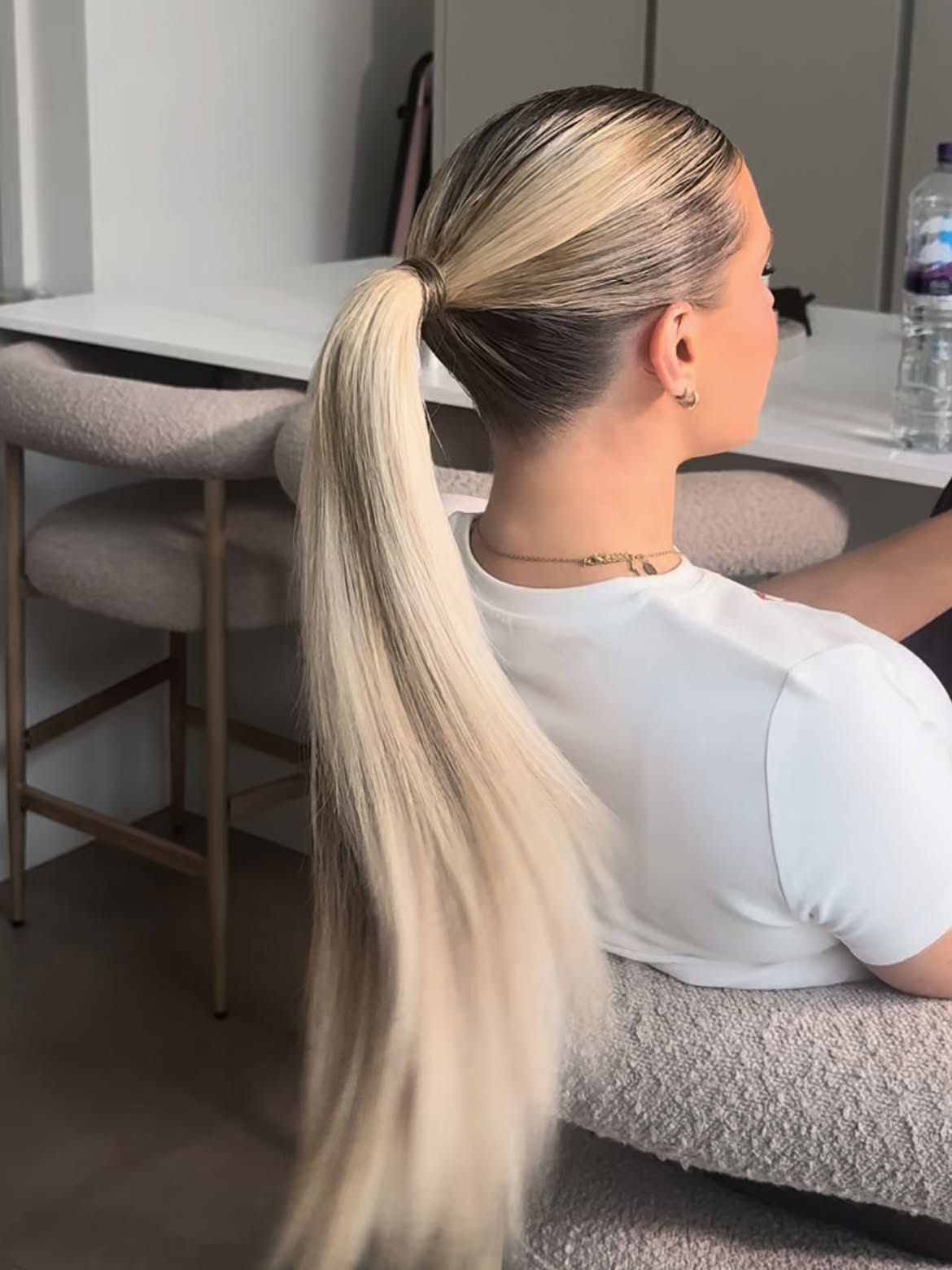 Sleek High Ponytail With Root Melt Blonde