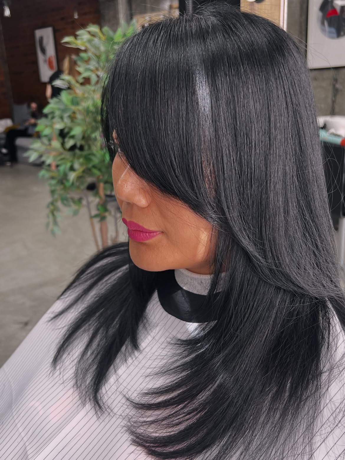 Sleek Long Layers With Side Swept Bangs