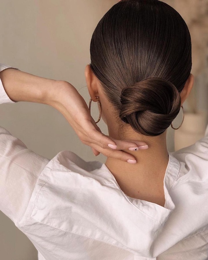 Sleek Low Twisted Bun For Fine Hair