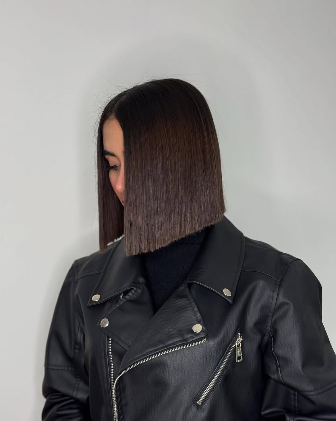 Sleek Razor Cut Bob With Deep Side Part