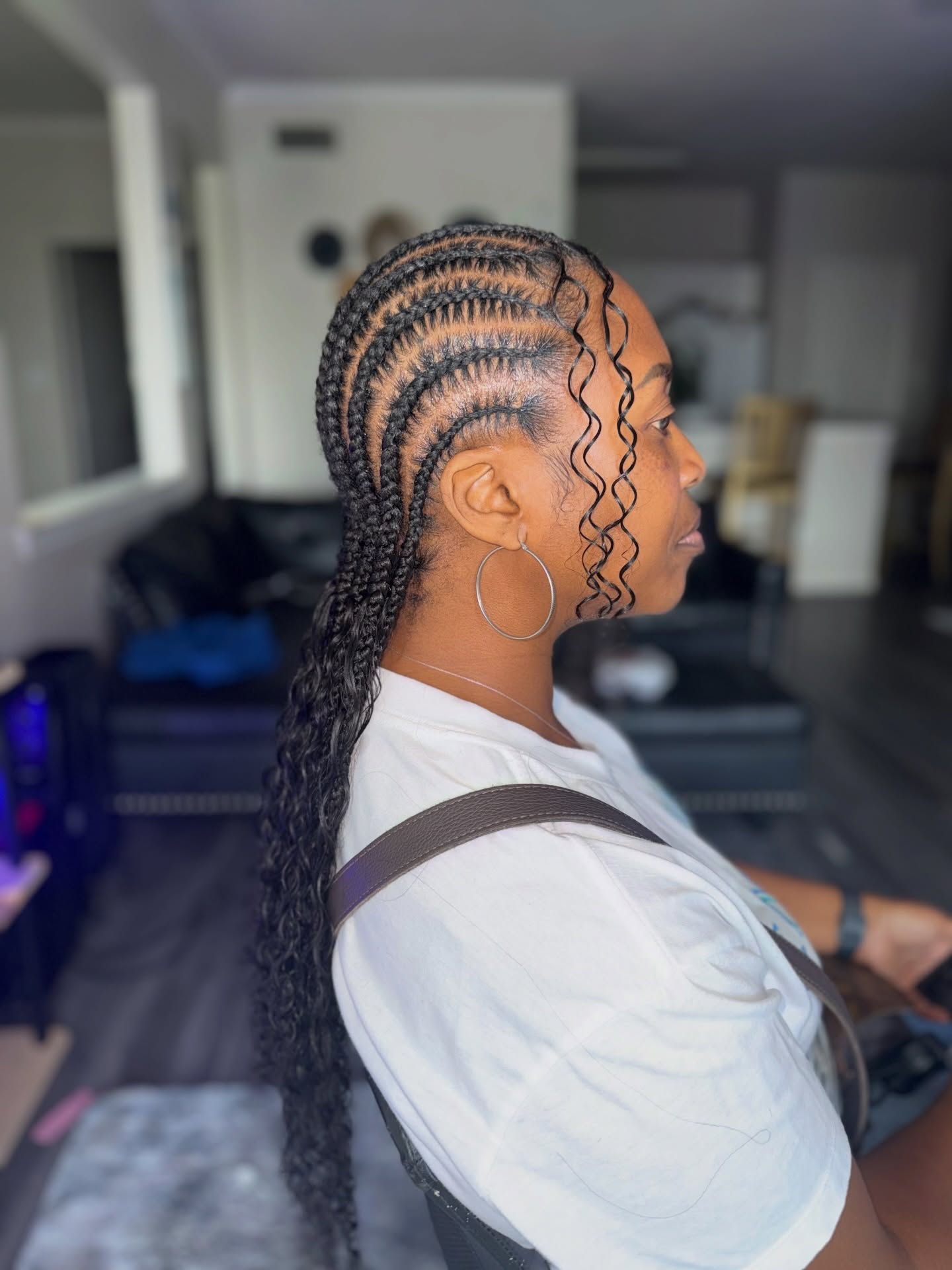 Sleek Straight Back Cornrows With Loose Curly Ends