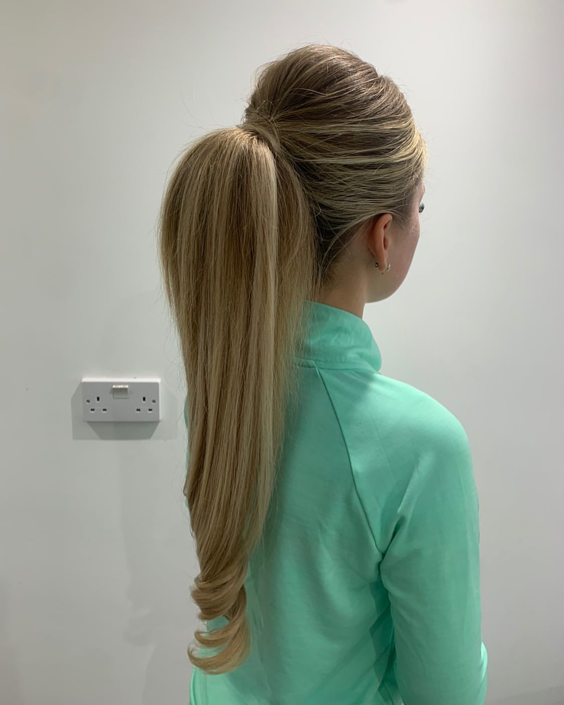 Sleek Wrapped High Ponytail On Dimensional Honey Blonde