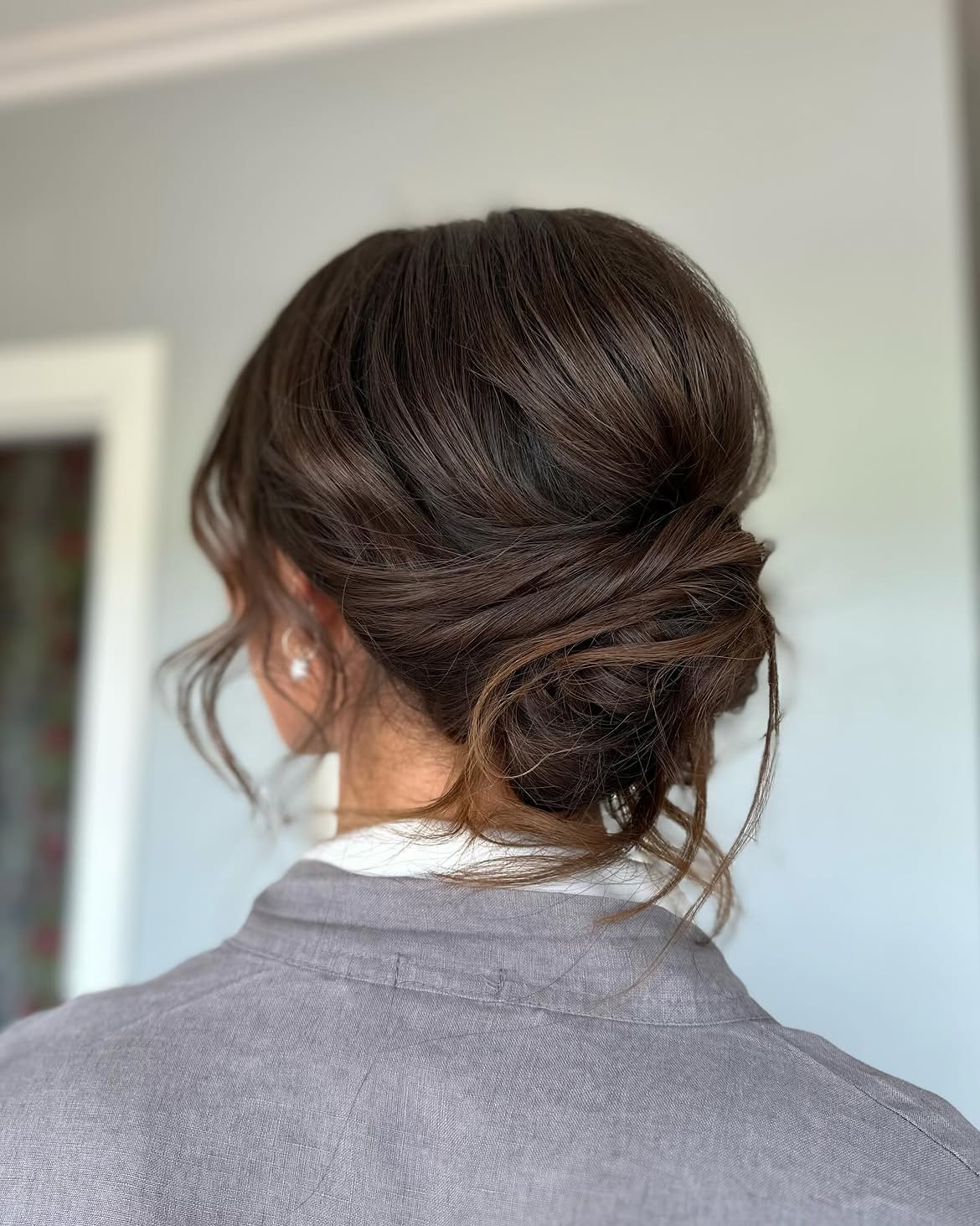 Soft Chignon With Wispy Strands