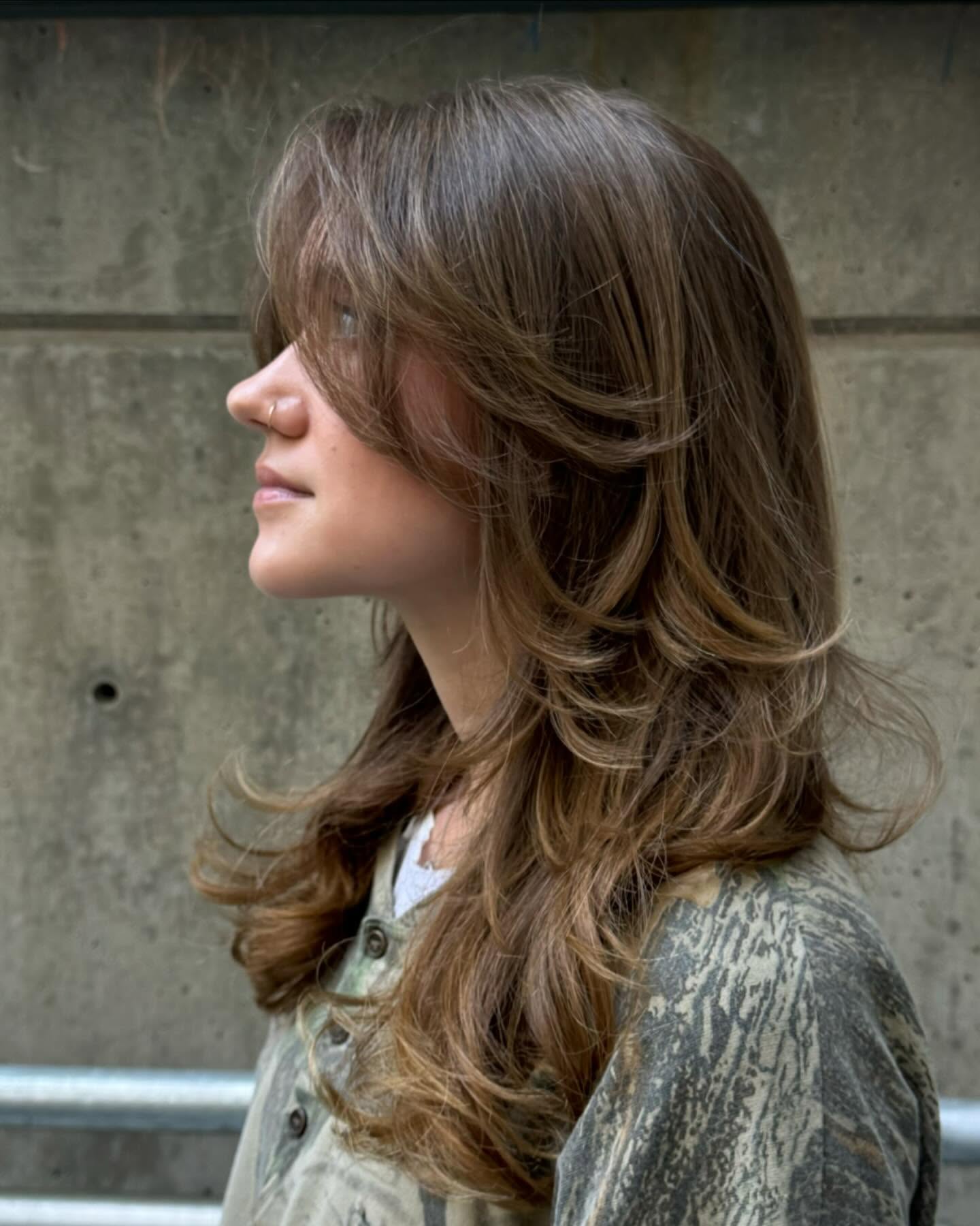 Soft Face Framing Layers With Curtain Bangs