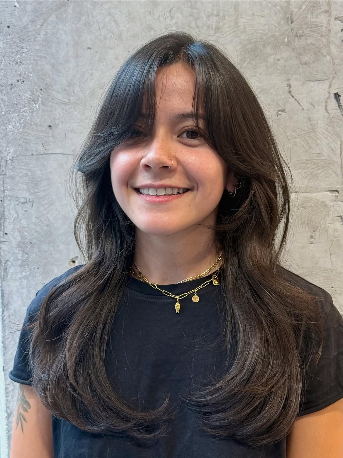 Soft Face Framing Layers With Side Swept Bangs