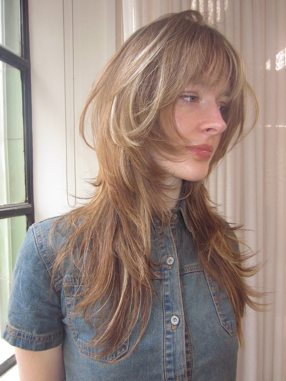 Soft Feathered Layers With Wispy Curtain Bangs