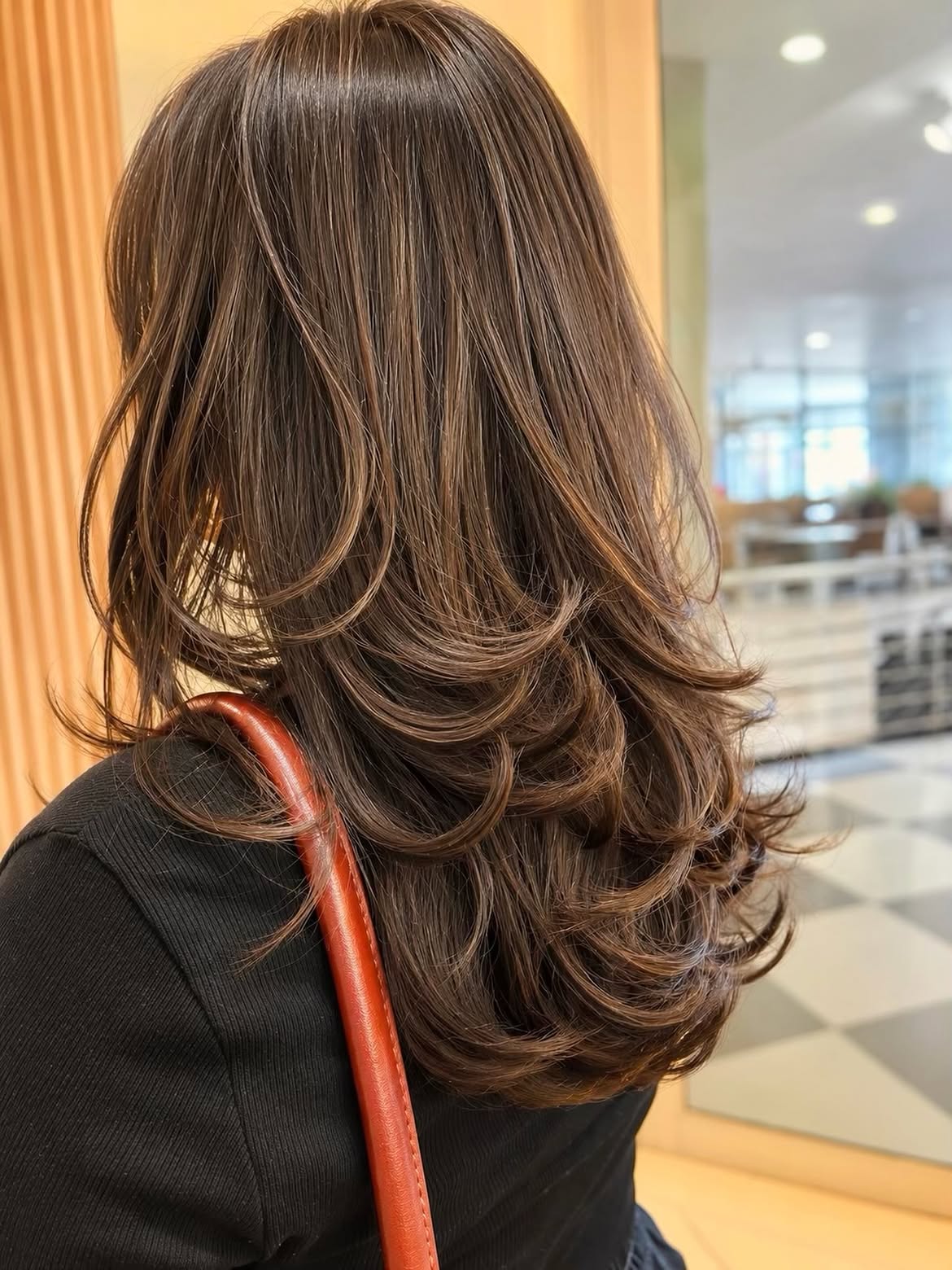 Soft Layered Butterfly Cut With Dimensional Brunette Highlights