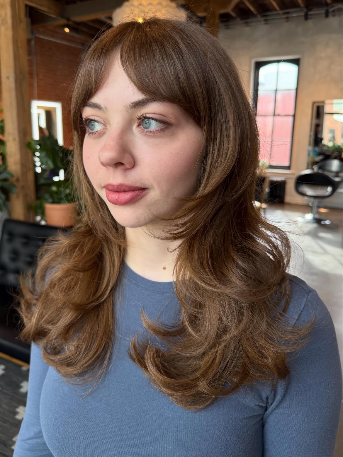 Soft Layered Butterfly Cut With Wispy Curtain Bangs