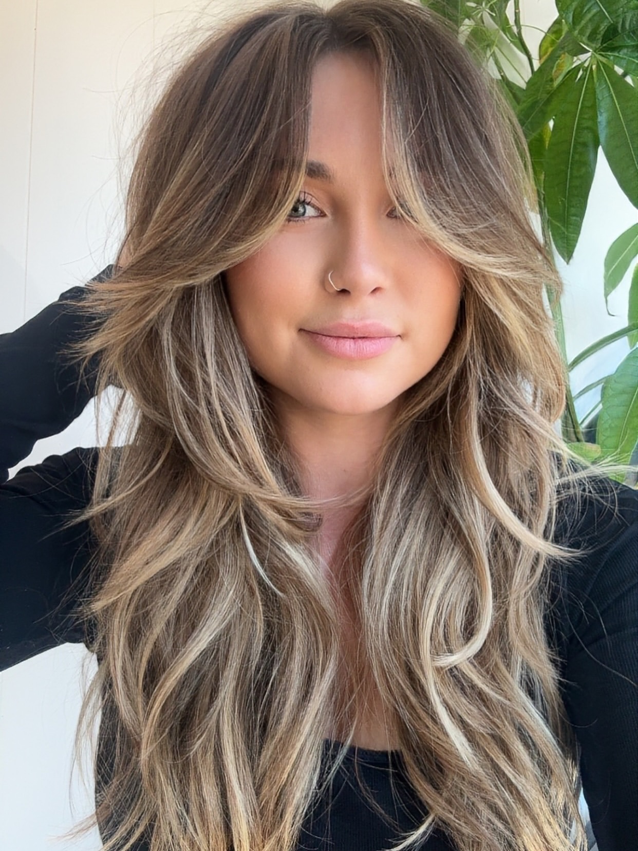 Soft Layers And Curtain Bangs On Bronde Hair