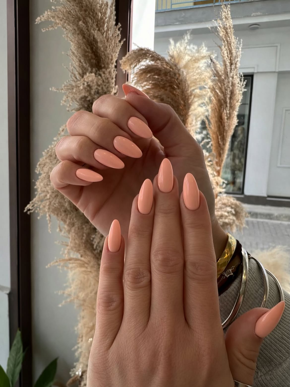 Soft Peach Almond Shape Glossy Manicure
