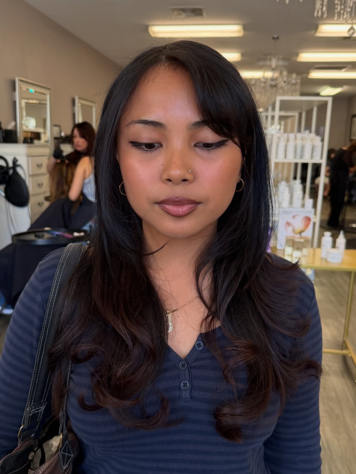 Soft Side Swept Bangs On Long Layered Brunette