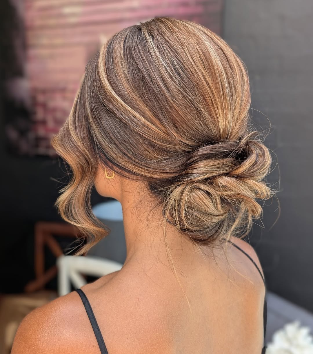 Soft Wavy Low Bun With Caramel Balayage