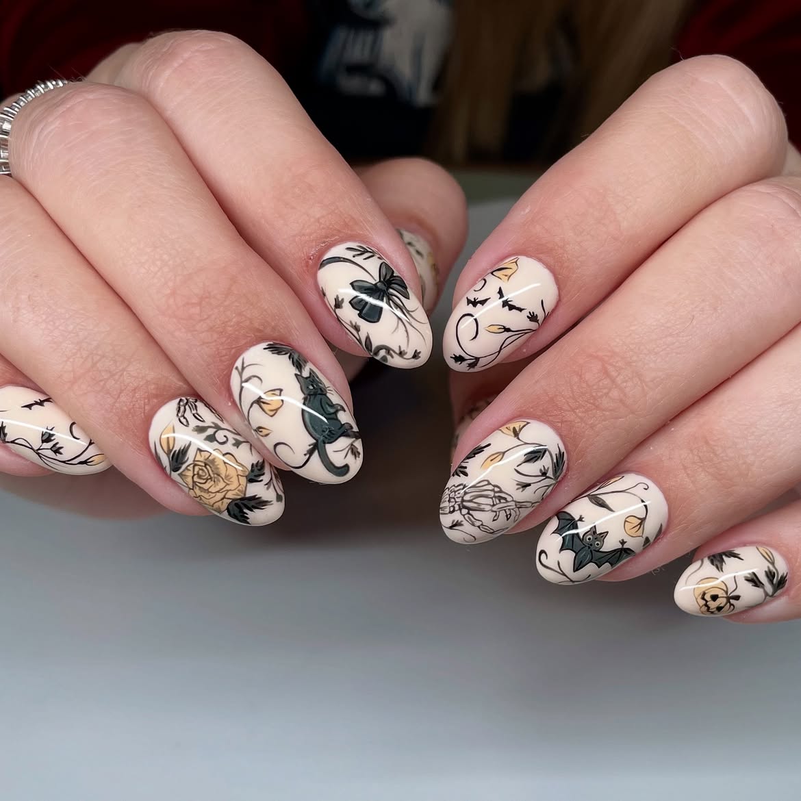 Spooky Halloween Oval Nails with Gothic Motifs